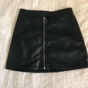 black faux leather mini skirt